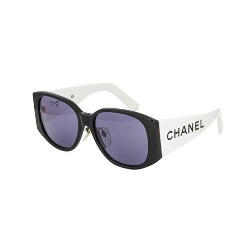 black and white chanel glasses.